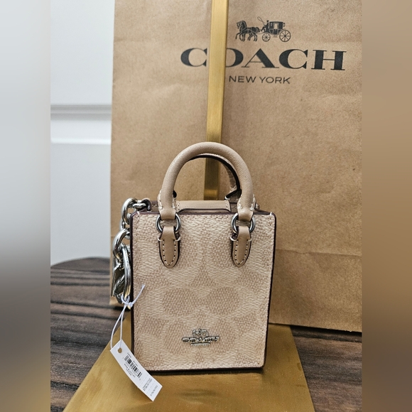 Coach Accessories - NWT COACH NORTH/SOUTH MINI TOTE BAG CHARM IN SIGNATURE CANVAS TAN & BEIGE